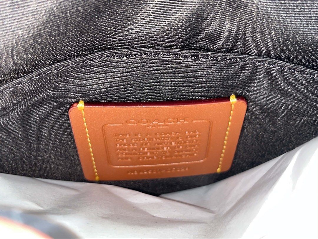 Coach Sullivan Flap Crossbody Bag - Grey Multi (Category: Cross-body Bags) located in Manila. Submitted by thriftnipapi7 (Listing ID 1451955471, Image 3). Description: - Authentic Coach Sullivan crossbody bag - Stylish grey multi color with signature C pattern - Unique New York and star patches for a personalized touch - Made in Vietnam.