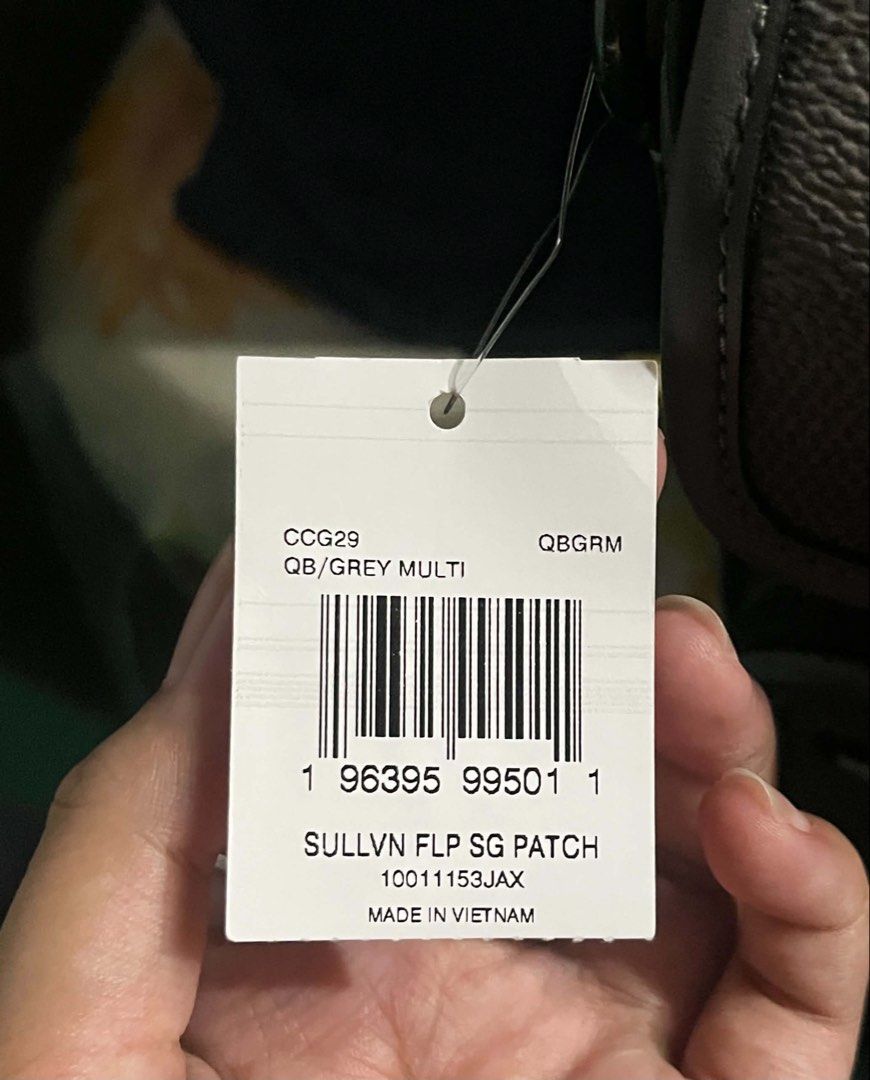 Coach Sullivan Flap Crossbody Bag - Grey Multi (Category: Cross-body Bags) located in Manila. Submitted by thriftnipapi7 (Listing ID 1451955471, Image 2). Description: - Authentic Coach Sullivan crossbody bag - Stylish grey multi color with signature C pattern - Unique New York and star patches for a personalized touch - Made in Vietnam.