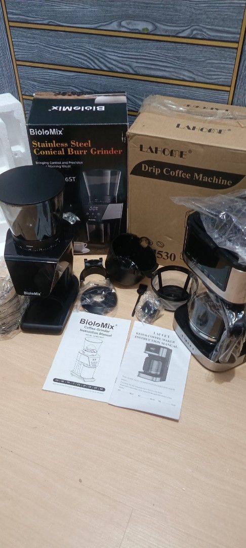 Coffee Grinder & Drip Coffee Machine SET (Category: Coffee Machines & Makers) located in Pasig City. Submitted by artliam888 (Listing ID 1451957844, Image 2). Description: - BioloMix Conical Burr Grinder with Stainless Steel Burrs - LaHome Drip Coffee Machine - Both items are in their original packaging - Includes instruction manuals for both grinder and coffee machine - Ideal set for any coffee enthusiast . BRANDNEW never been used . complete wi