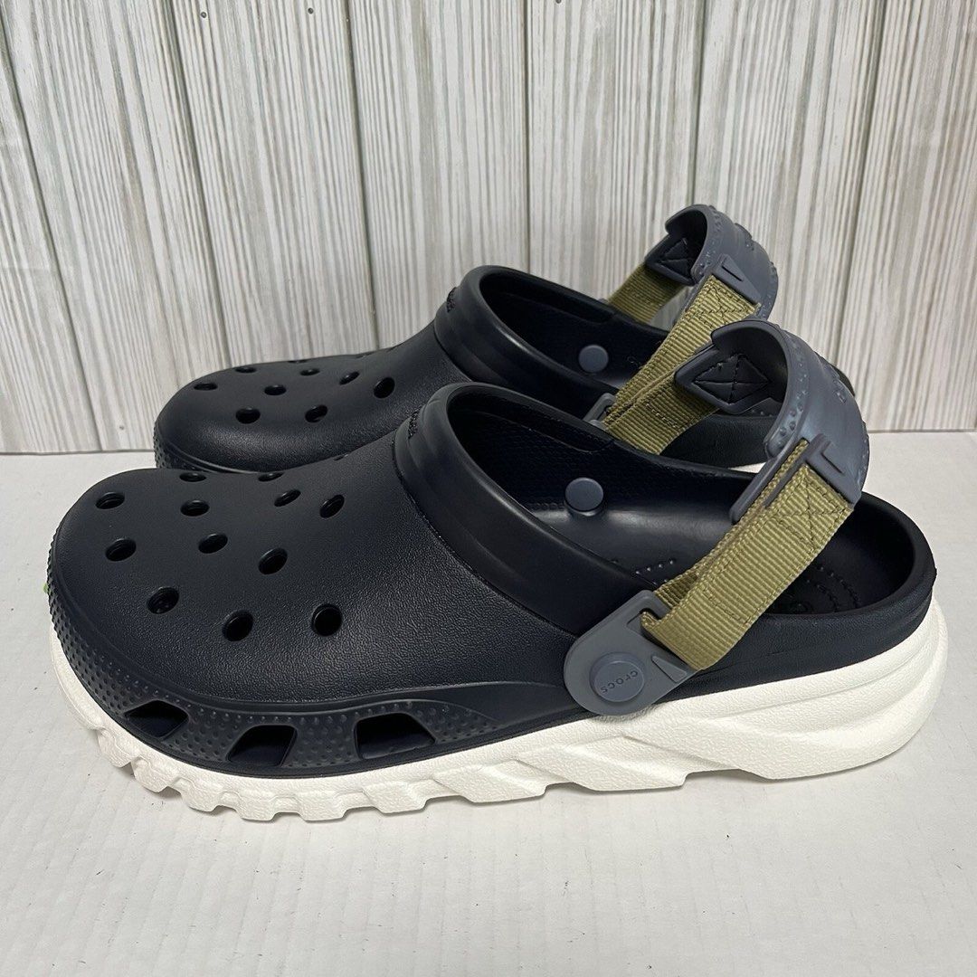 Crocs Duet Max 2 Clog (Category: Slippers & Slides) located in Mandaluyong City. Submitted by ipau888 (Listing ID 1451989099, Image 1). Description: - Navy blue Crocs All-Terrain clogs - Khaki and grey adjustable strap at the back - Chunky white sole for enhanced comfort and grip - Ideal for outdoor adventures and casual wear - Easy to clean and highly durable.