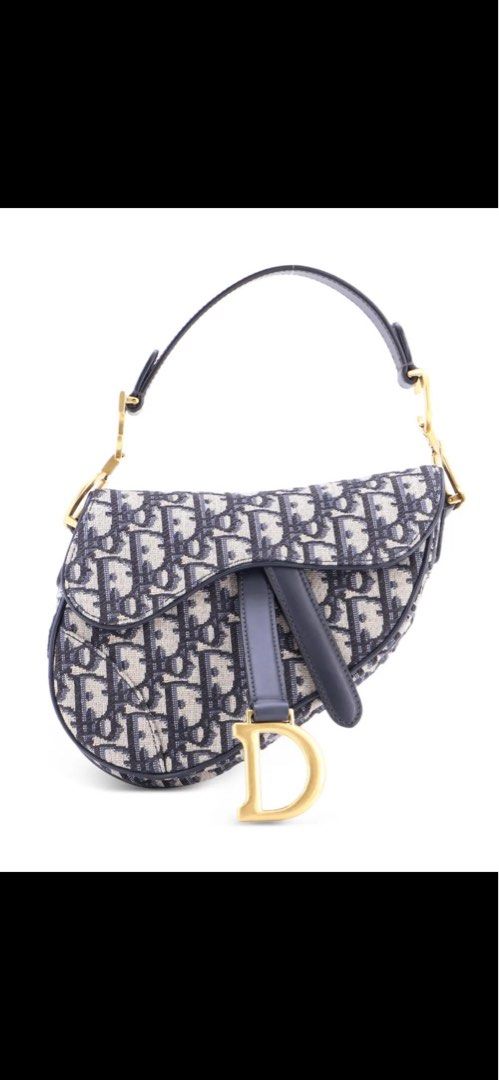 Mini Dior Saddle Bag Oblique Canvas (Category: Luxury Bags & Wallets) located in San Fernando. Submitted by ThrifinityandBeyond (Listing ID 1452032664, Image 1). Description: - ORIGINAL Dior Saddle Bag - Iconic Dior Oblique canvas - Genuine leather trim - Elegant gold hardware - Includes original dust bag - Comes with authenticity card (from dior vancouver) - A must-have classic for your collection - complete inclusion (box, card, pouch) .
