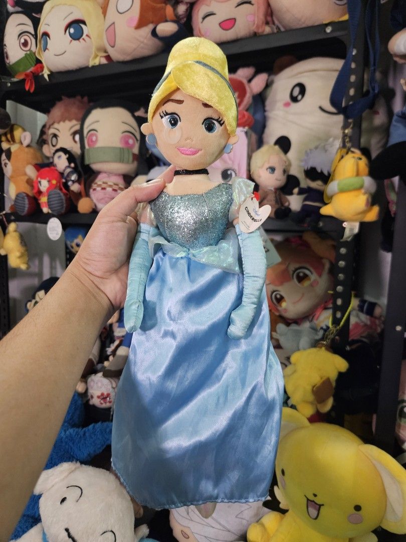 Disney Cinderella Plush Doll (Category: Plushies & Soft Toys) located in Lingayen. Submitted by vargasjer57073 (Listing ID 1452036278, Image 2). Description: - Cinderella plush doll - Iconic blue ball gown with sparkly bodice - Soft and huggable material - Ideal for Disney fans and collectors - Great for display or playtime.