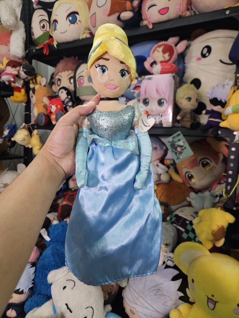Disney Cinderella Plush Doll (Category: Plushies & Soft Toys) located in Lingayen. Submitted by vargasjer57073 (Listing ID 1452036278, Image 1). Description: - Cinderella plush doll - Iconic blue ball gown with sparkly bodice - Soft and huggable material - Ideal for Disney fans and collectors - Great for display or playtime.