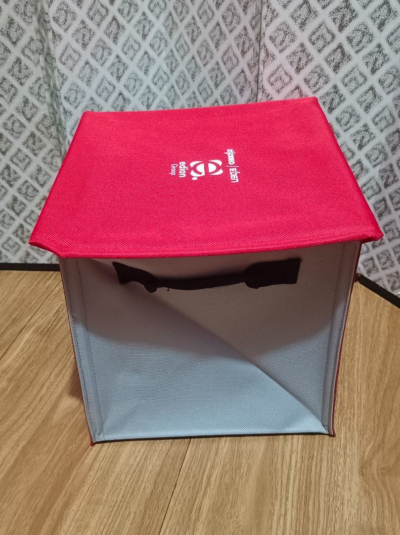 Edion Group Red Foldable Storage Box (Category: Storage Boxes & Baskets) located in Makati City. Submitted by nyxhemera26 (Listing ID 1452101790, Image 2). Description: Edion Group Red Foldable Storage Box - Features side handles for easy carrying - Folds flat for convenient storage - Approximately 10 inches tall - Ideal for organizing toys, clothes, and more - Also available in blue 🔵.