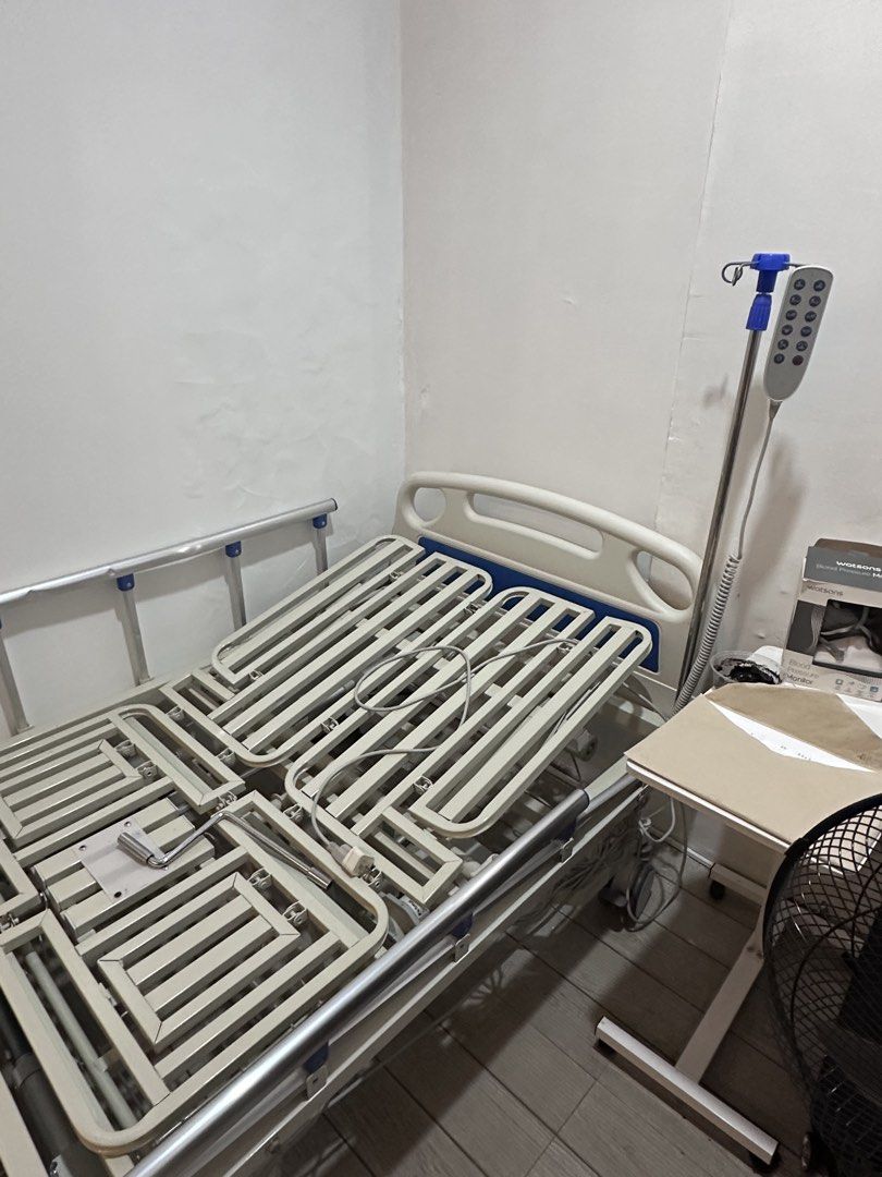 Electric Hospital Bed with Remote Control (Category: Bed Frames & Mattresses) located in Quezon City. Submitted by royallion.66575c (Listing ID 1452015034, Image 1). Description: - Adjustable electric hospital bed - Remote control for bed positions - Safety side rails included - Wheels for easy mobility - Perfect for home care needs - Selling as is.