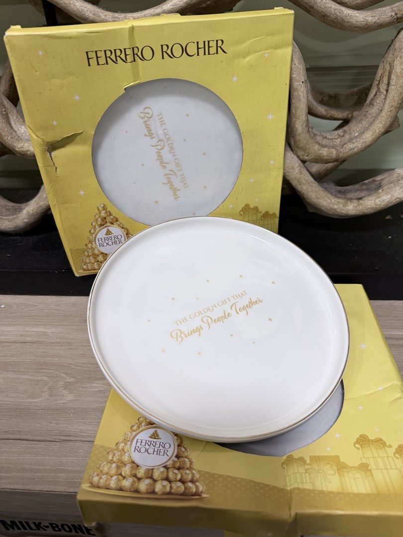 Ferrero Rocher Limited Edition (Category: Other Food & Drinks) located in Pasig City. Submitted by iambernabe (Listing ID 1451939509, Image 1). Description: ceramic plate 2pcs for 350 - Authentic Ferrero Rocher white plate - Elegant gold trim around the edge - Features the iconic quote: 'The Golden Gift That Brings People Together' - Comes with its original box.