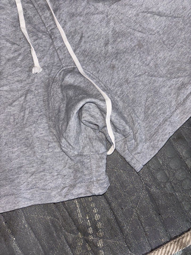 FOG Essentials Drop Crotch Grey Shorts (Category: Shorts) located in Tagbilaran City. Submitted by noeeeelll (Listing ID 1452095192, Image 2). Description: - FOG Essentials Grey Shorts - Size: XL - Elastic waistband with drawstring - Zipper pockets on both sides - Comfortable material, suitable for lounging or workouts - Minor marks visible on fabric (please check photos for details).