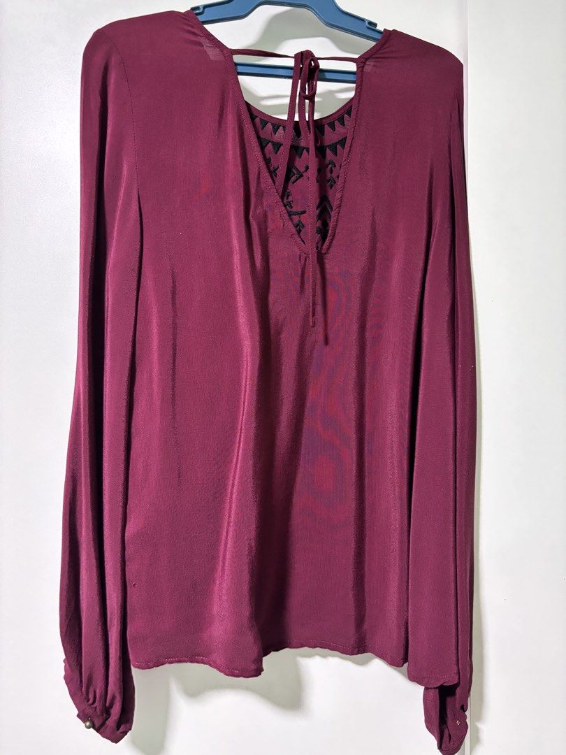 Forever 21 Maroon Embroidered Long-Sleeve Blouse Size S (Category: Blouses) located in Mandaluyong City. Submitted by k_and_k_preloved_corner (Listing ID 1452029461, Image 2). Description: - Forever 21 Long-sleeves Blouse - Size Small - Color: Maroon - Light Material - Embroidered Details.
