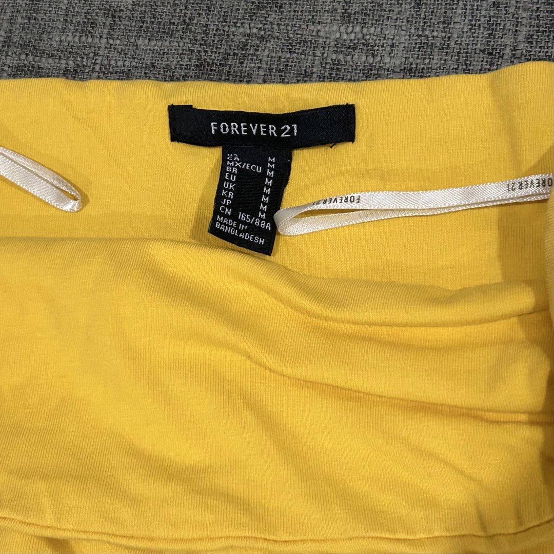 Forever 21 Yellow Tube Top (Category: Others Tops) located in Quezon City. Submitted by tdclutters (Listing ID 1452060850, Image 2). Description: * Used only once during my Disneyland trip * Size: Medium * RFS: not into tube tops anymore.