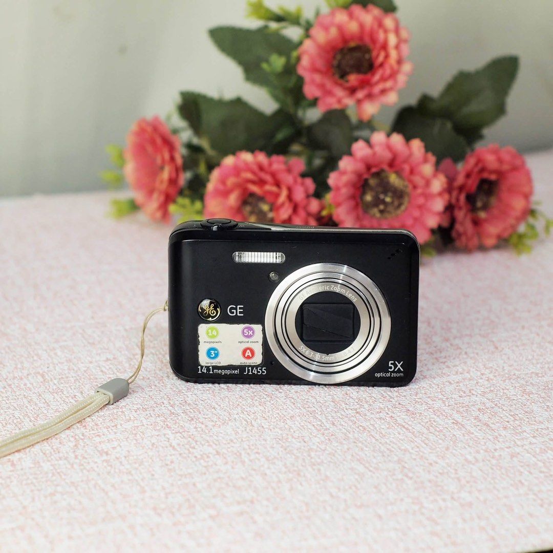 GE J1455 Digital camera (Category: Cameras) located in Paranaque City. Submitted by digicamera_zone_ph (Listing ID 1451936576, Image 2). Description: ✨ GE J1455 Vintage Digital Camera ✨ 📸 Capture that dreamy Y2K & vintage CCD aesthetic! ✅ No Issues ✅ 100% Fully Functional ✅ Includes: • Battery 🔋 • Charger 🔌 • Camera Strap 🎒 📷 Specifications: • 14.1MP CCD Sensor • 5x Optical Zoom • 3.0” LCD Display • Electronic Image Stabilization • Face Dete