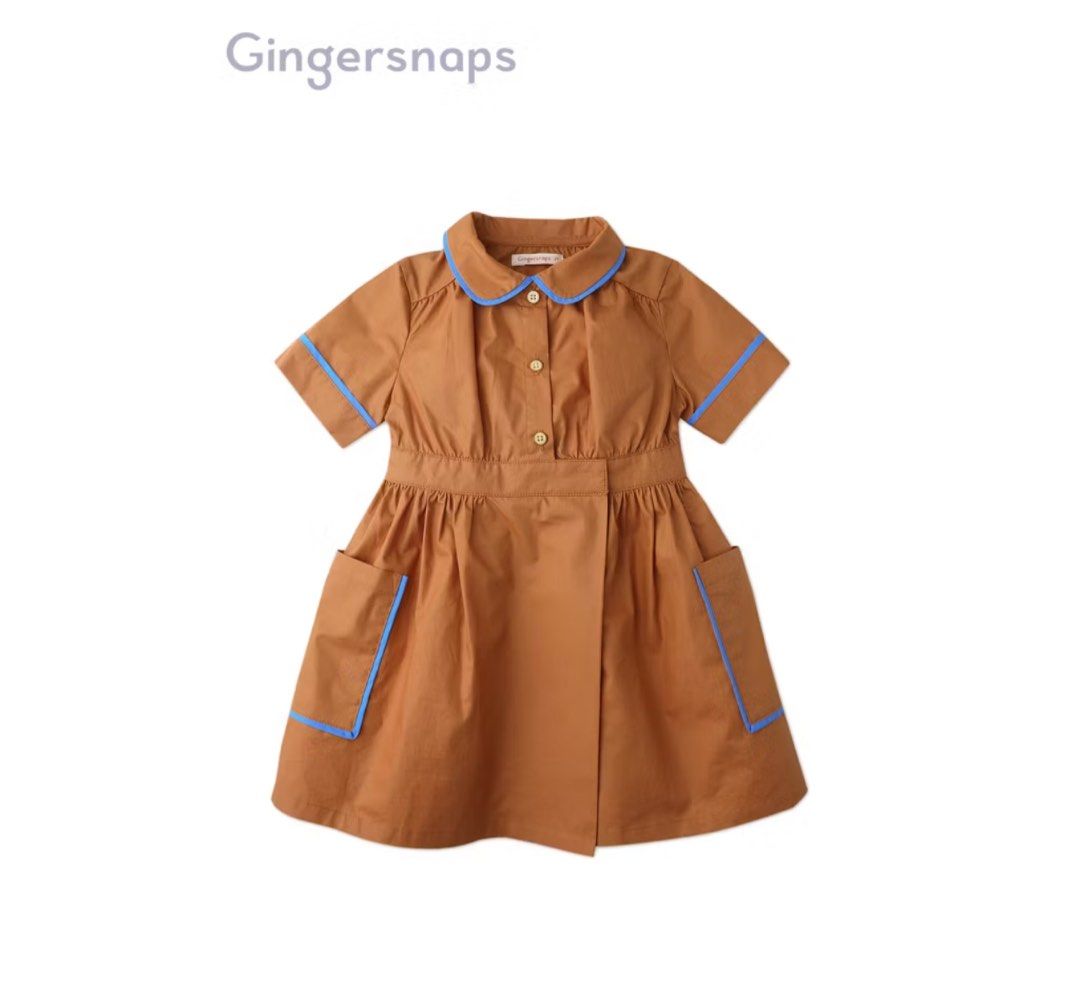 Gingersnaps Brown Dress with Blue Trim (Category: Babies & Kids Fashion) located in Iloilo. Submitted by fari3 (Listing ID 1452078595, Image 1). Description: Cute brown dress from Gingersnaps. Short sleeves with blue trim. Has two pockets on the front, also with blue trim. Button up front. Elasticated waist. Skirt flares out. Great for casual wear..