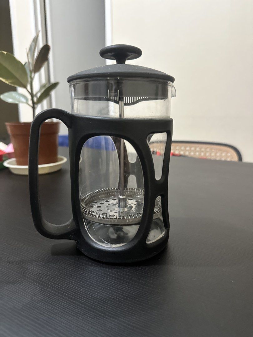 Glass French Press Coffee Maker with Black Frame (Category: Coffee Machines & Makers) located in Quezon City. Submitted by jolibi (Listing ID 1452002325, Image 1). Description: - Effortless home coffee brewing with a French press. - Durable glass carafe with a sturdy black frame. - Fine mesh filter in the plunger ensures no coffee grounds in your cup. - Simple to use: just add coffee and hot water. - Easy to clean for daily use. - Ideal for your 