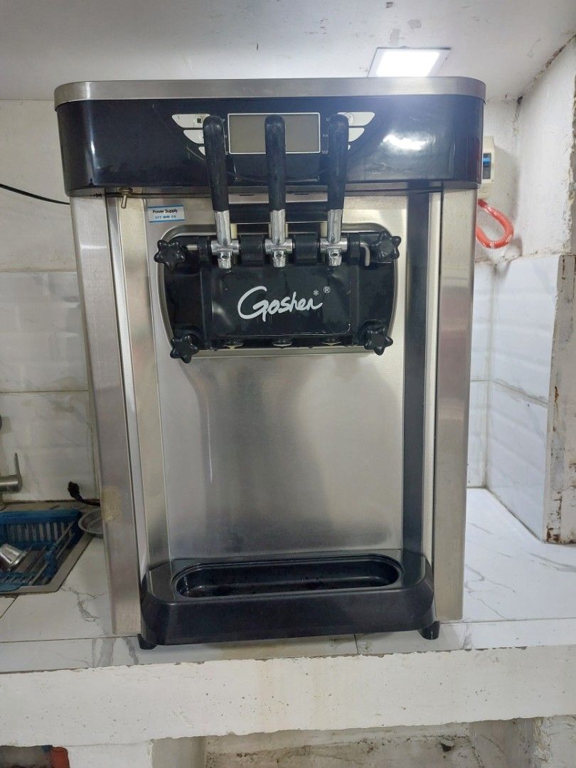 Goshen Soft Serve Ice Cream Machine (Category: Other Kitchen Appliances) located in Antipolo. Submitted by crypticsmile (Listing ID 1452039204, Image 2). Description: - Commercial soft serve ice cream machine - Three nozzle - Durable stainless steel body - Ideal for business ventures - Fully functional and ready for use -Buyers should inspect the merch by themselves. Place is in lower Antipolo City. .