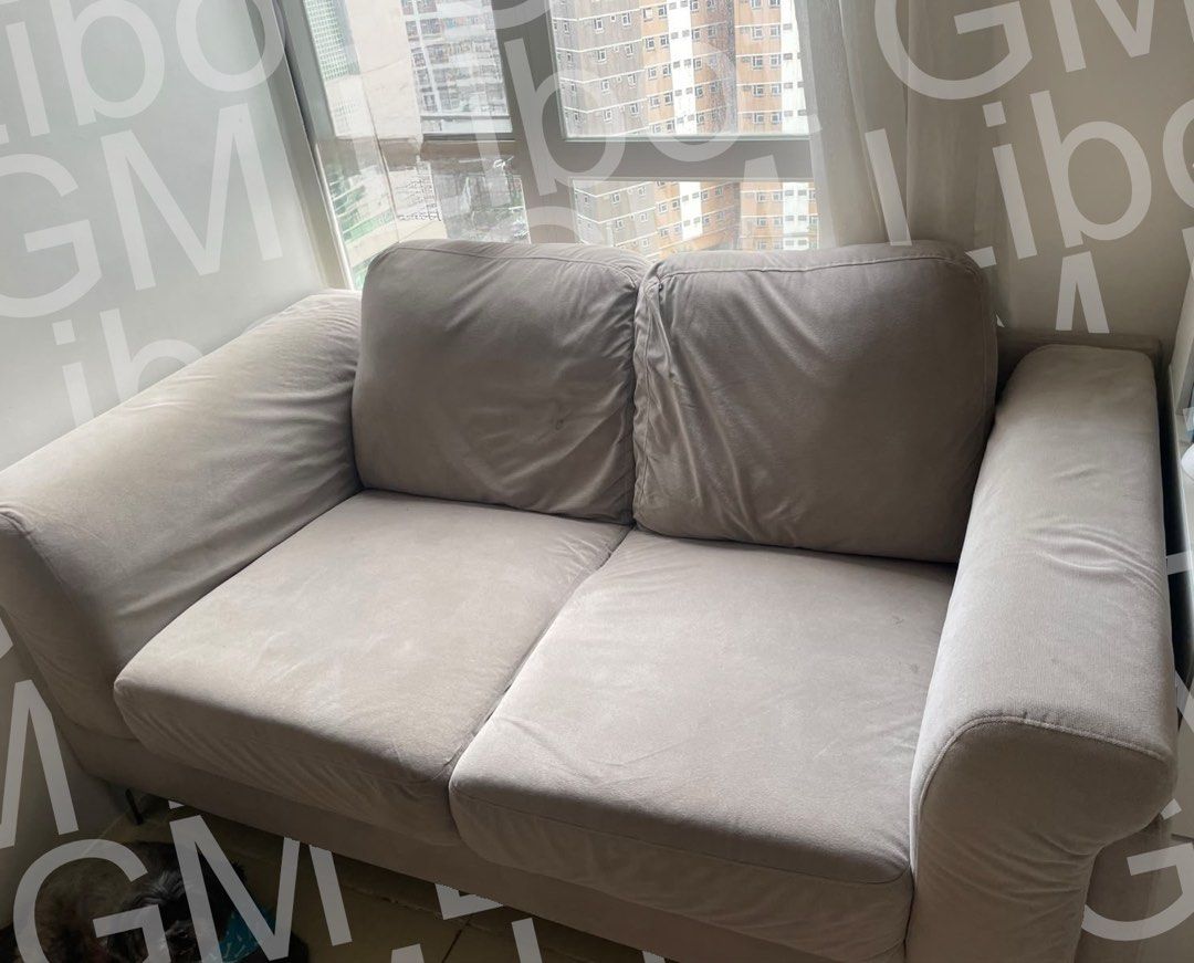 Grey 2-Seater Sofa / Loveseat Couch (Category: Sofas) located in Mandaluyong City. Submitted by gmlbt (Listing ID 1452047663, Image 1). Description: Negotiable (OG price was ₱35k) - Comfortable Grey 2-seater sofa / loveseat couch - grey fabric - Plush, inviting cushions - Wide, soft arms - Simple, clean design fits most spaces - Ideal for small apartments or extra seating Just needs cleaning as there are minor stains but it’s well-loved and cared