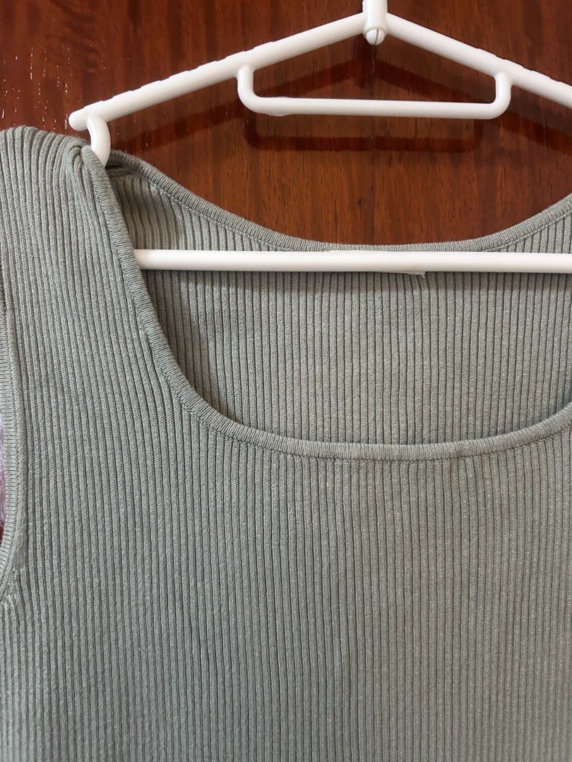 GU Square Neck Sleeveless Tank Top (Category: Sleeveless) located in Quezon City. Submitted by st5ff (Listing ID 1452081583, Image 2). Description: - Basic ribbed tank top - Square neckline - Sleeveless design - Stretchy material for a comfortable fit - Available in light green and black - Versatile for layering or wearing on its own 250 each, get both for 400.