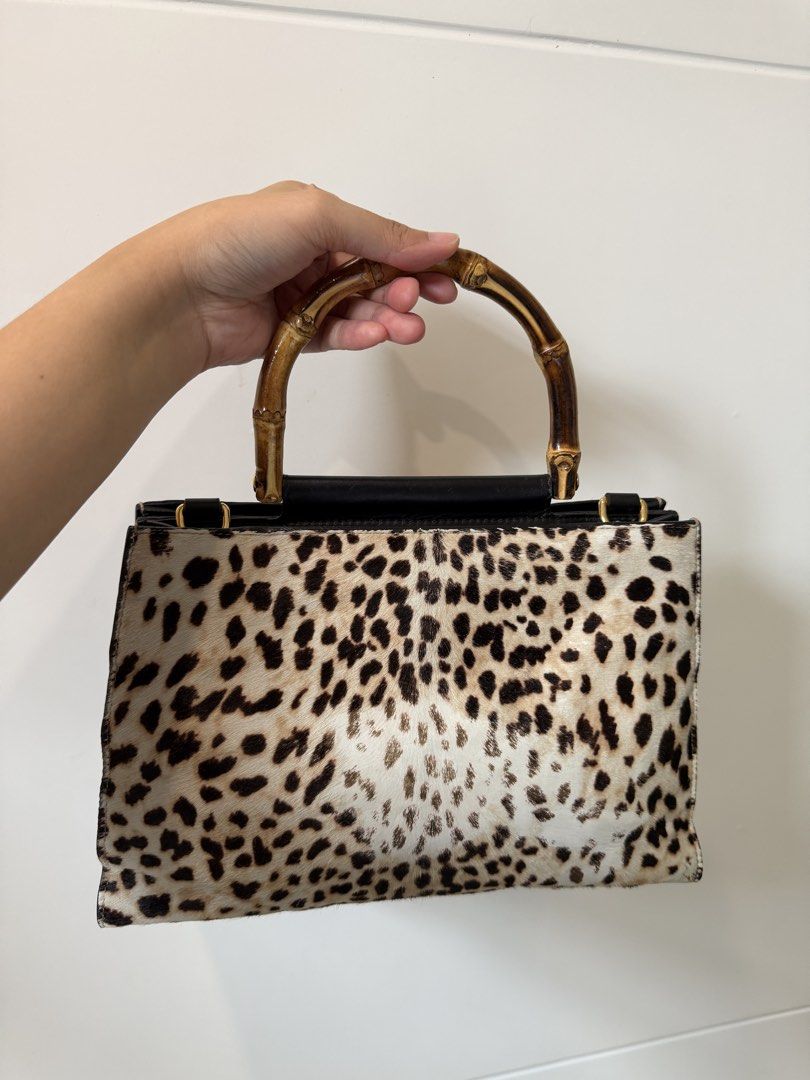 Gucci Leopard Print Top Handle Bag (Category: Luxury Bags & Wallets) located in San Jose del Monte. Submitted by shoprheag (Listing ID 1452038996, Image 2). Description: *REPRICED* FROM ₱ 17,500 TO ₱15,000 YOU MAY ALSO SHOOT YOUR OFFER AS LONG AS IT IS REASONABLE (NOT HALF THE POSTED PRICE, OK?) THIS BAG IS ALSO NOT FOR PICKY BUYERS! SELLING LOW ALREADY FOR A GUCCI BAG. -Orig w/ care tag and B101 authentication cert Leopard print handbag (made of