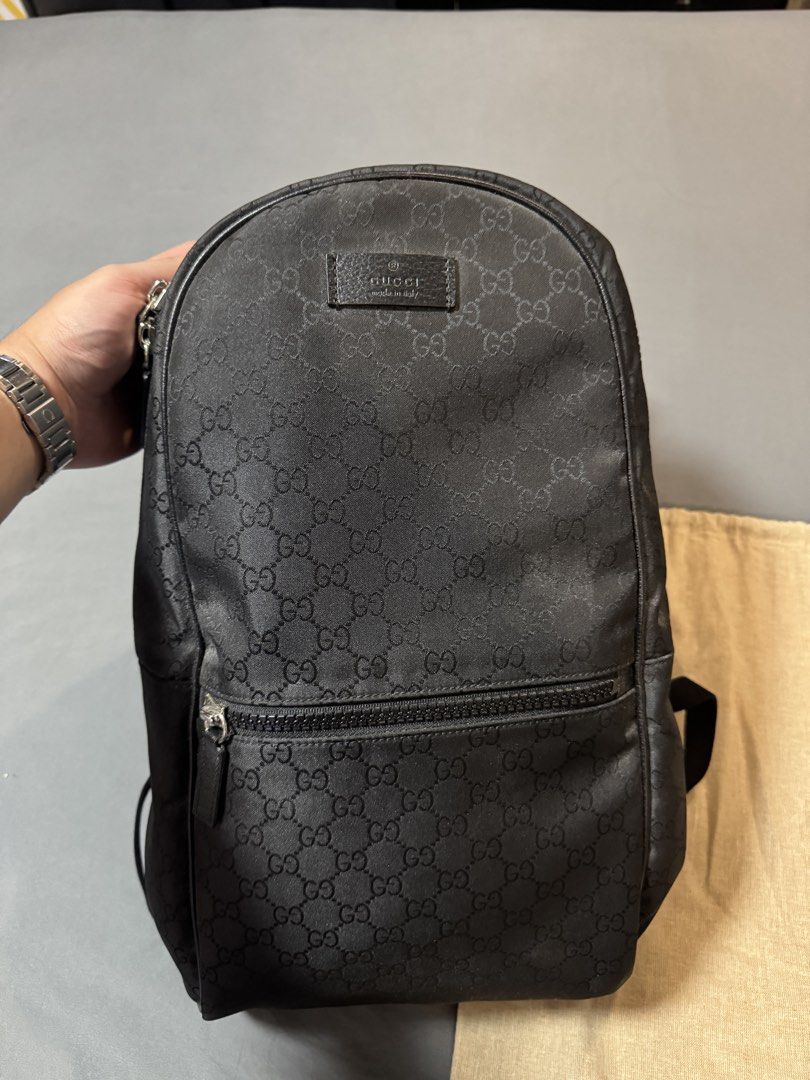 Gucci Slim Backpack GG Black (Category: Luxury Bags & Wallets) located in Marikina City. Submitted by dman112 (Listing ID 1451930246, Image 1). Description: - Gucci Slim Backpack Black GG Monogram - Used twice - Leather trims in perfect condition - Internal zippered pocket for extra storage - Additional front zippered pocket for quick access - Adjustable shoulder straps for a comfortable fit - Ideal for daily use or travel - Original was at $1,70