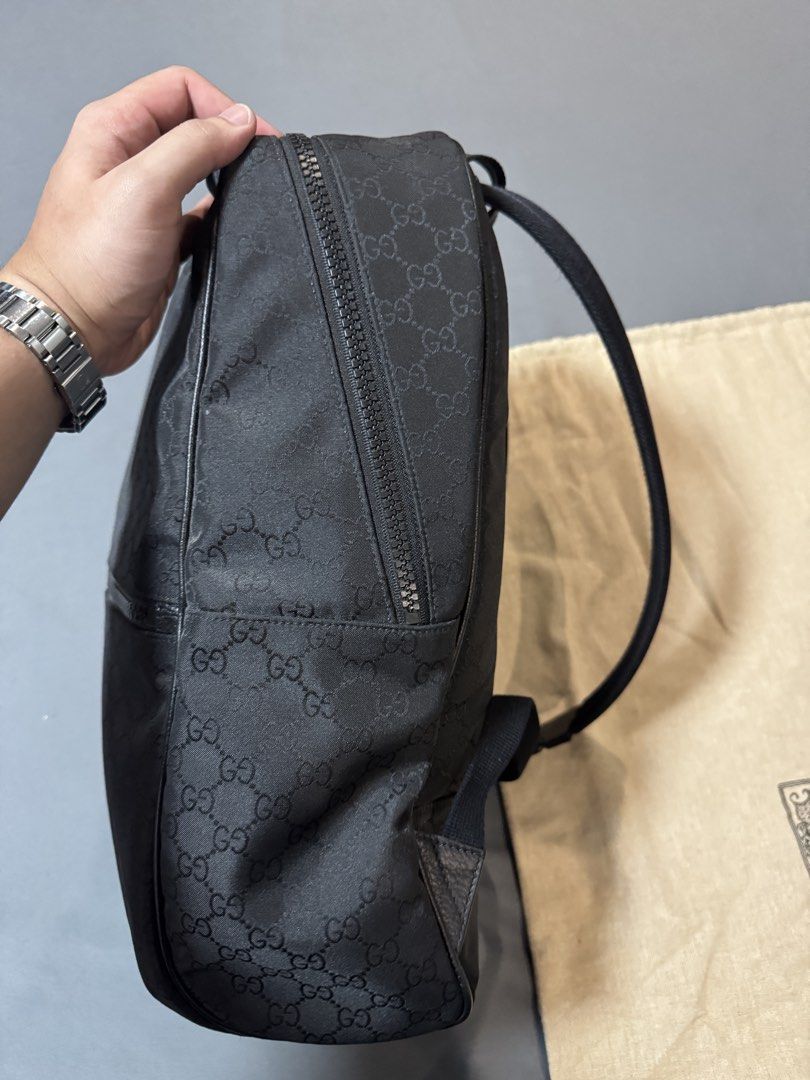 Gucci Slim Backpack GG Black (Category: Luxury Bags & Wallets) located in Marikina City. Submitted by dman112 (Listing ID 1451930246, Image 2). Description: - Gucci Slim Backpack Black GG Monogram - Used twice - Leather trims in perfect condition - Internal zippered pocket for extra storage - Additional front zippered pocket for quick access - Adjustable shoulder straps for a comfortable fit - Ideal for daily use or travel - Original was at $1,70