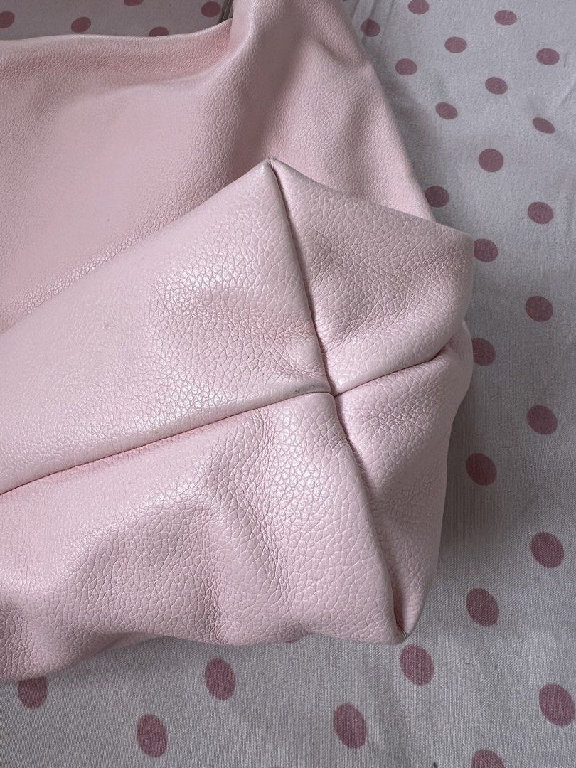 GVN Large Hobo Bag in Blush (Light Pebbled) (Category: Shoulder Bags) located in Makati City. Submitted by juberi (Listing ID 1451907289, Image 3). Description: • still nego :) • has a few areas of peeling on the leather • interior has some dirt/stains • please refer to the photos for the actual condition. • no cancellations, refunds, or returns. • can do same day delivery via Lalamove or shipping via LBC/J&T/Flash Express. 💌 loc: makati.