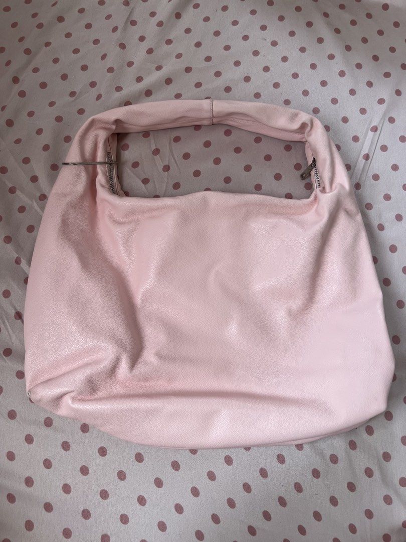 GVN Large Hobo Bag in Blush (Light Pebbled) (Category: Shoulder Bags) located in Makati City. Submitted by juberi (Listing ID 1451907289, Image 2). Description: • still nego :) • has a few areas of peeling on the leather • interior has some dirt/stains • please refer to the photos for the actual condition. • no cancellations, refunds, or returns. • can do same day delivery via Lalamove or shipping via LBC/J&T/Flash Express. 💌 loc: makati.