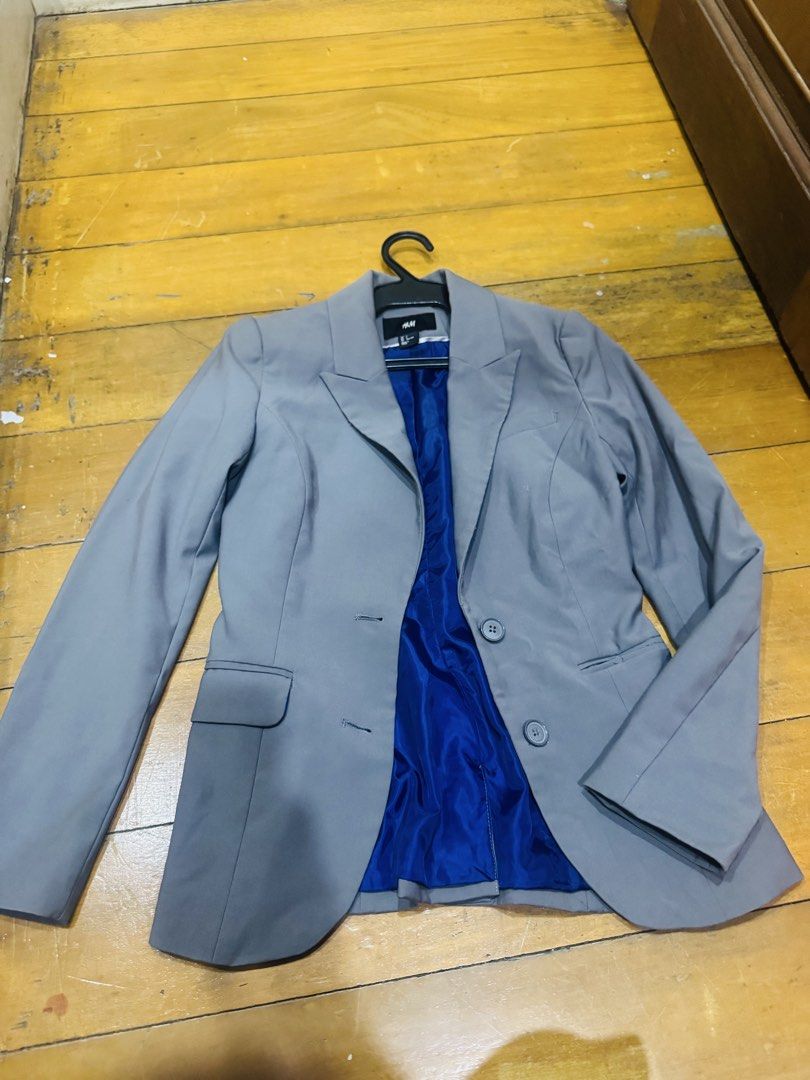 H&M Grey Blazer with Blue Lining (Category: Coats, Jackets and Outerwear) located in Las Pinas. Submitted by katfg (Listing ID 1451947730, Image 1). Description: - used 2x - H&M Grey Blazer, size 2 - xsmall - Classic fit - Bright blue inner lining - Two-button front closure - Two front flap pockets - Ideal for workwear or smart casual looks.