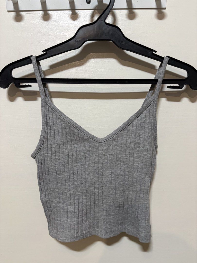 H&M Grey Ribbed Spaghetti Strap Crop Top (Category: Sleeveless) located in Taguig. Submitted by cftbncs (Listing ID 1452038863, Image 1). Description: - Grey ribbed crop top from H&M - Spaghetti straps and V-neckline - Super comfy and stretchy material - Ideal for layering or wearing solo - Easy to pair with jeans or shorts - Fits like an XXS.