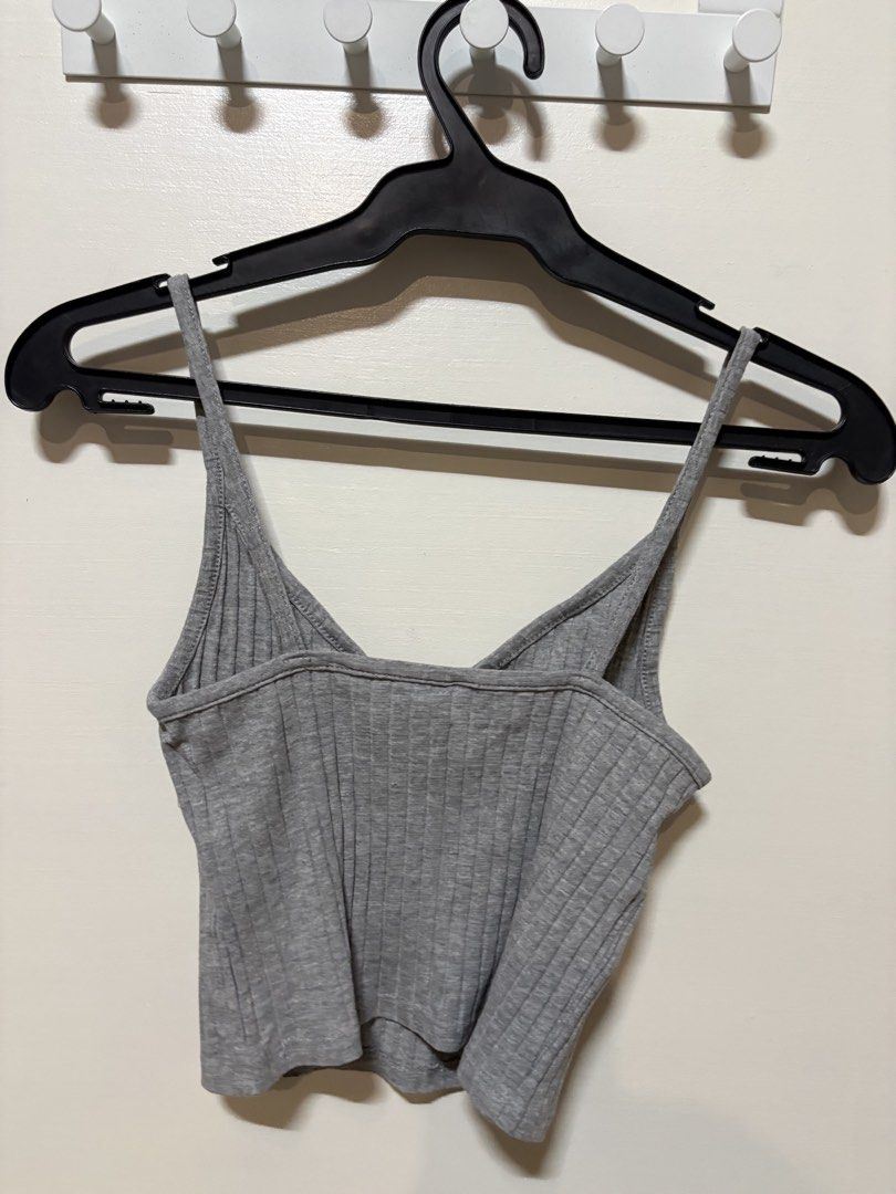 H&M Grey Ribbed Spaghetti Strap Crop Top (Category: Sleeveless) located in Taguig. Submitted by cftbncs (Listing ID 1452038863, Image 3). Description: - Grey ribbed crop top from H&M - Spaghetti straps and V-neckline - Super comfy and stretchy material - Ideal for layering or wearing solo - Easy to pair with jeans or shorts - Fits like an XXS.