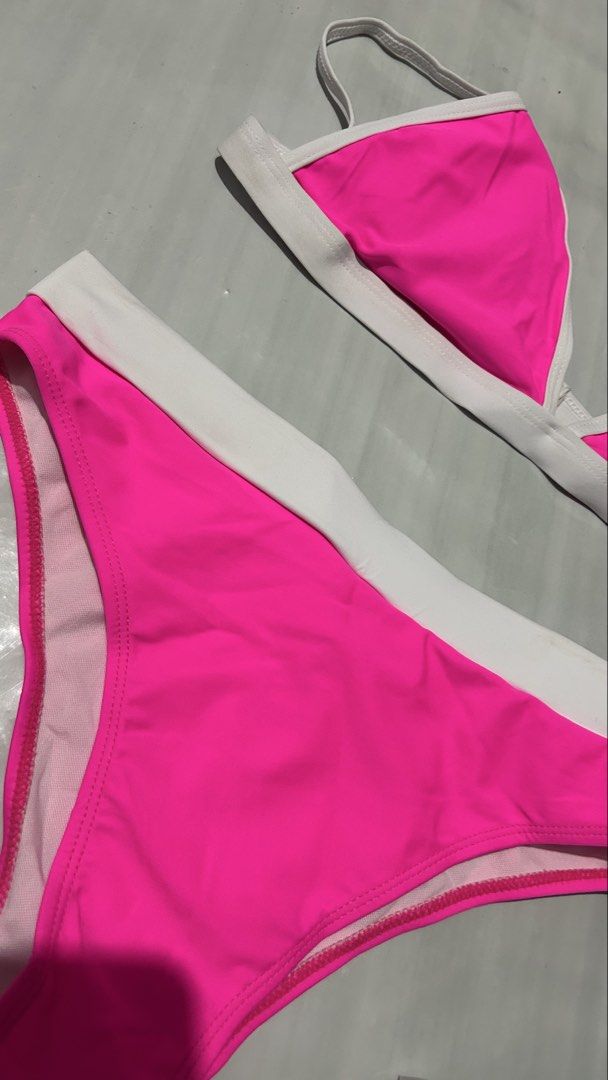 Hot Pink Triangle Bikini with White Trim (Category: Bikinis & Swimsuits) located in Marikina City. Submitted by chartan15 (Listing ID 1452016866, Image 2). Description: Never been used, decluttering Hot pink bikini set! Triangle top, adjustable straps. White waistband bottoms. Perfect for vacation!.