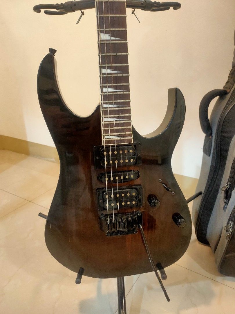 Ibanez GIO Electric Guitar (Category: Musical Instruments) located in Manila. Submitted by shop.zane (Listing ID 1451923658, Image 3). Description: Ibanez GIO Electric Guitar (Black Burst) + Padded Gig Bag Selling Ibanez GIO electric guitar in very good condition. Perfect for beginners, intermediate players, or anyone looking for a reliable guitar for practice, gigs, or recording. Features: HSH pickup configuration (Humbucker-Single-Humbucker) Tr