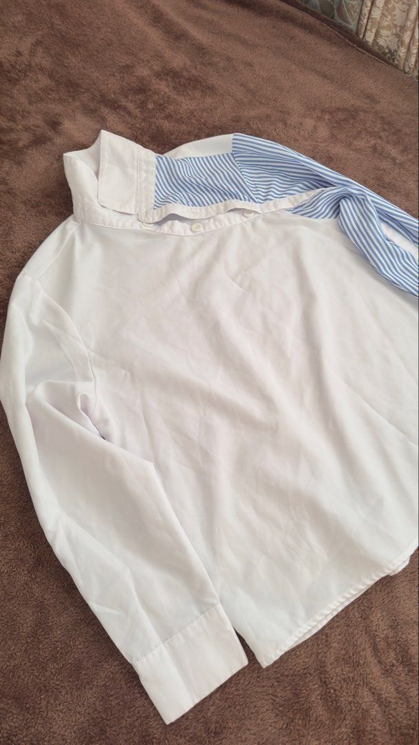 Incerun Asymmetrical Long Sleeve Shirt (Category: Formal Shirts) located in Manila. Submitted by rgnkyle (Listing ID 1451950549, Image 2). Description: White long sleeve shirt Unique asymmetrical neckline No issues RFS: not being used anymore.