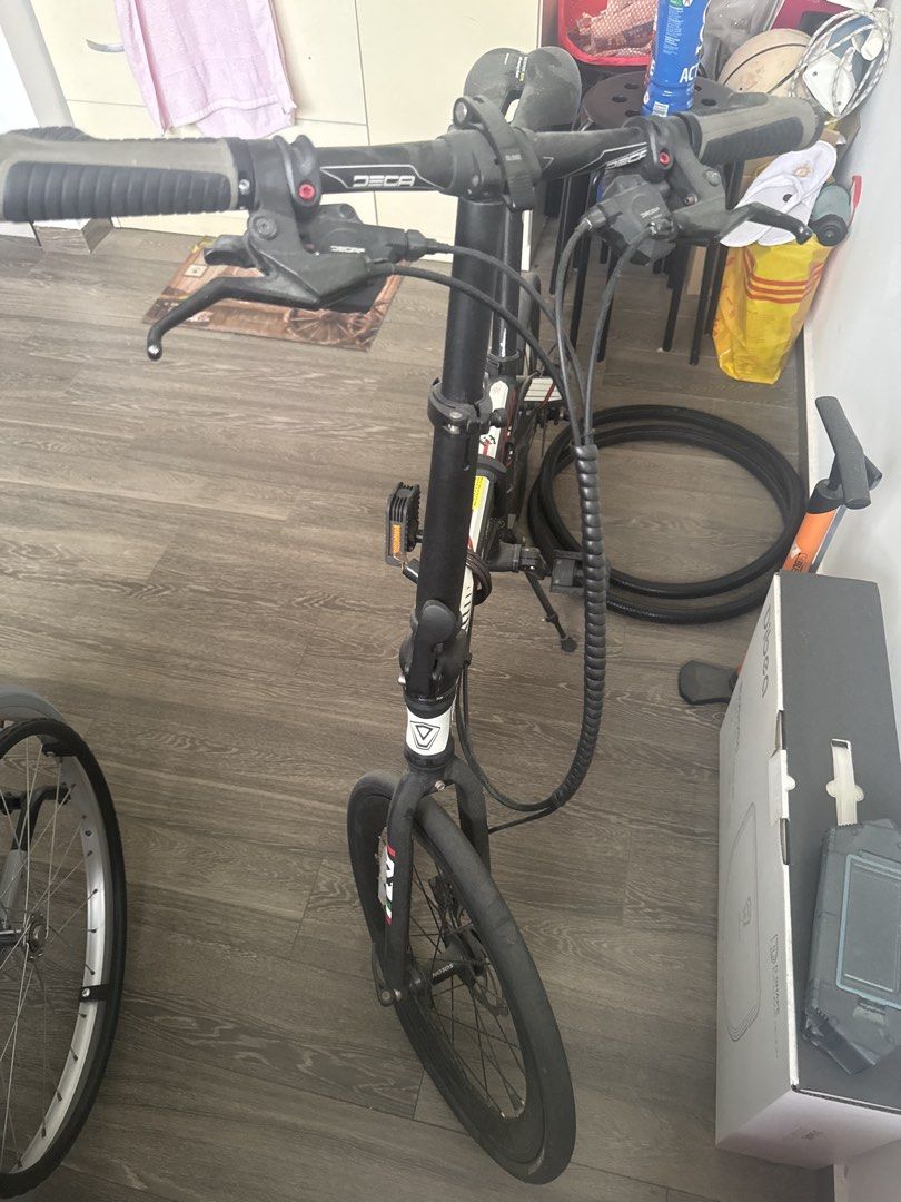 JAVA Folding Bicycle (Category: Bicycles) located in Singapore. Submitted by stanley.loh.862 (Listing ID 1451910819, Image 3). Description: Java Fit 18 Speed 20” Foldable Internal cabling alloy foldable frameset. Shifter: Deca Front derailleur: Deca Rear derailleur: Deca Crankset: 43-52T – 2 Speed – Deca Hollow Crank. Cassette: SunShine 11-28T- 9 speed. Brakes: Deca String Actuated Hydraulic Brakes. Chain: KMC 9 Speed Chain Wheelset: 20” DECAF 40