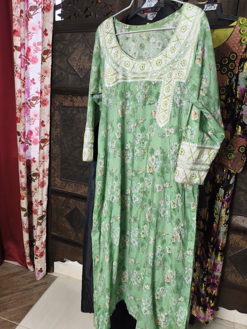 Jelebiya cotton (Category: Dresses) located in Kangar. Submitted by ibubmuslimshop (Listing ID 1452015604, Image 2). Description: -bust 42 length 52inch Light green dress with a pretty floral print - Features intricate embroidery on neckline and cuffs - Long sleeves - Perfect for casual outings or dressing up - Easy to style for various occasions.