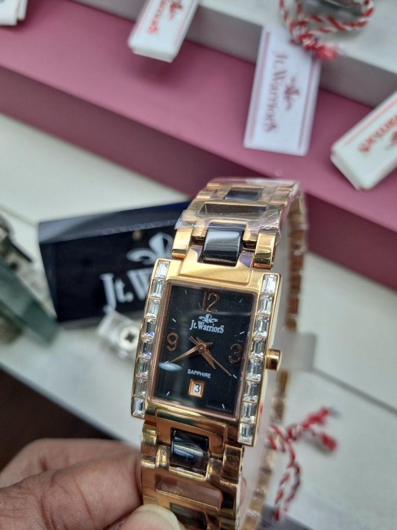 jt.warriors Rose Gold Rectangle Watch with Crystal Accents (Category: Watches) located in Kuala Lumpur. Submitted by swifttiger_0ba6f6 (Listing ID 1452009787, Image 1). Description: - Rectangular watch with a sleek black face - Rose gold band with stylish black and white accents - Dazzling crystal details on the bezel - Durable and scratch-resistant sapphire glass - Convenient date display at the 3 o'clock position - Comes with original tags for 