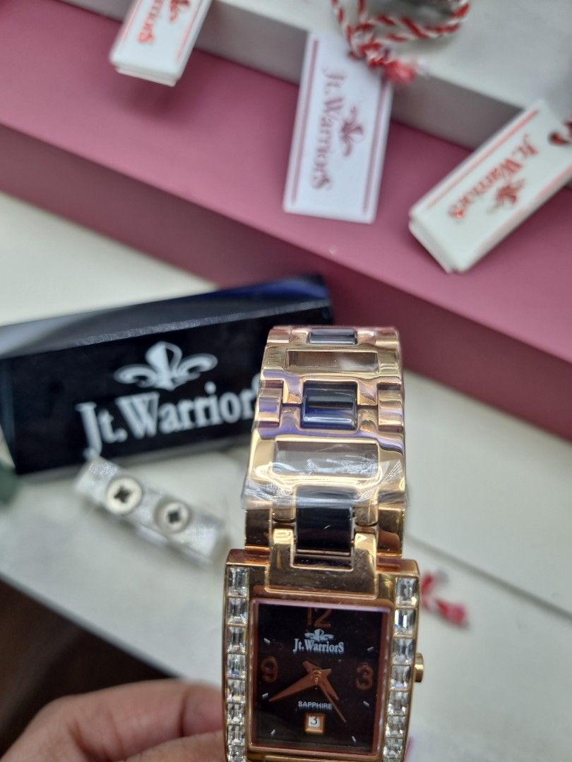 jt.warriors Rose Gold Rectangle Watch with Crystal Accents (Category: Watches) located in Kuala Lumpur. Submitted by swifttiger_0ba6f6 (Listing ID 1452009787, Image 2). Description: - Rectangular watch with a sleek black face - Rose gold band with stylish black and white accents - Dazzling crystal details on the bezel - Durable and scratch-resistant sapphire glass - Convenient date display at the 3 o'clock position - Comes with original tags for 