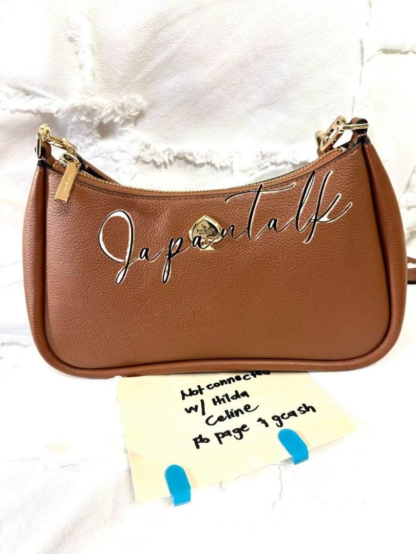 Kate Spade Brown Leather Shoulder Bag (Category: Luxury Bags & Wallets) located in Bulacan. Submitted by vintage_purge (Listing ID 1451914211, Image 1). Description: - Authentic Kate Spade brown leather shoulder bag - Features elegant gold hardware details - Secure zipper closure - Adjustable strap for comfortable wear - Ideal for everyday use.