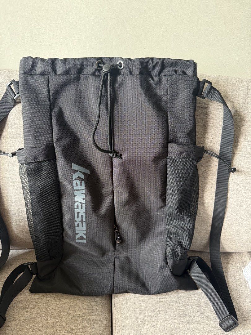 Kawasaki Badminton Backpack Drawstring Bag Black (Category: Backpacks) located in Mandaluyong City. Submitted by kcpreloved1204 (Listing ID 1451908442, Image 1). Description: - Black Kawasaki drawstring backpack - Features side mesh pockets for water bottles - Secure drawstring closure at the top - Adjustable straps for a comfortable fit - Ideal for sports activities or everyday errands - Dimensions: L360 x W130 x H490mm.