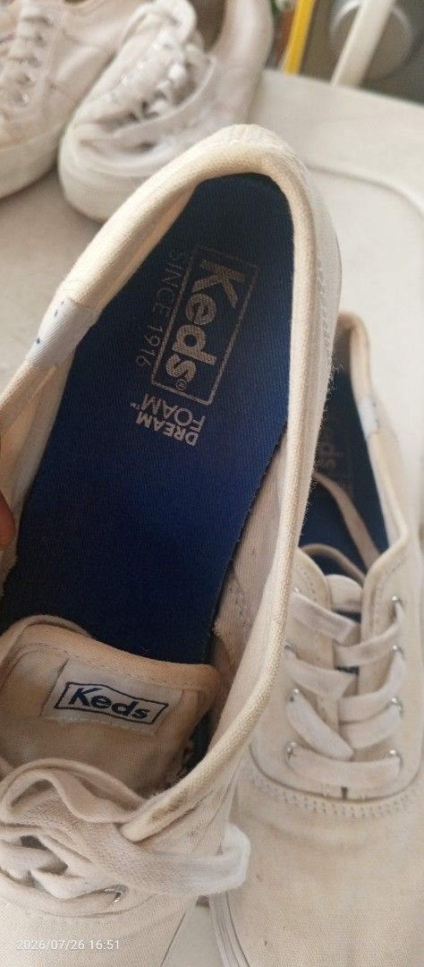 Keds White Canvas Sneakers Dream Foam (Category: Sneakers) located in Taytay. Submitted by ecs1991 (Listing ID 1452005026, Image 3). Description: - Classic white Keds canvas sneakers - Features Dream Foam insoles for ultimate comfort - Lace-up closure for a secure fit - Soles show some signs of wear, adding character - Versatile and easy to pair with any outfit - Ideal for everyday casual wear - needs cleaning natago na po bawal sa maarte see pic