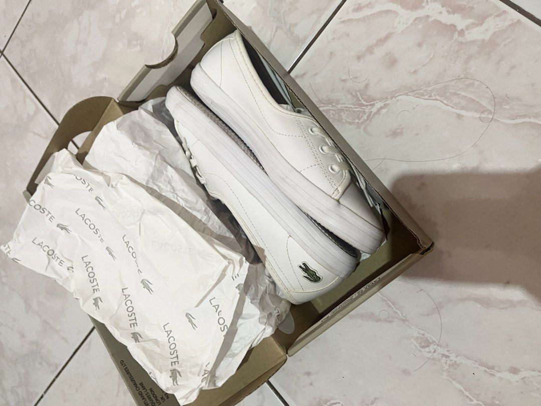 Lacoste White Leather Sneakers with Box (Category: Sneakers) located in Santa Rosa. Submitted by totgaaaaa (Listing ID 1451912929, Image 3). Description: - Authentic White Leather Lacoste Sneakers - Comes with Original Box and Tissue Paper - Classic Lace-Up Design - Ideal for Casual Wear - Cleaned and Ready for a New Owner.