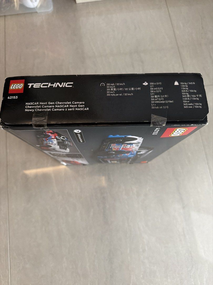 Lego Technic 42153 NASCAR Next Gen Chevrolet Camaro (Built) (Category: Lego & Building Sets) located in Singapore. Submitted by born2 (Listing ID 1451952824, Image 5). Description: - Lego Technic 42153 NASCAR Next Gen Chevrolet Camaro - Authentic Lego Technic build experience - Detailed replica of the NASCAR Next Gen Chevrolet Camaro - Ideal for collectors and fans of Lego and racing - Bought from Malaysia at RM229 - There is some visible damage 
