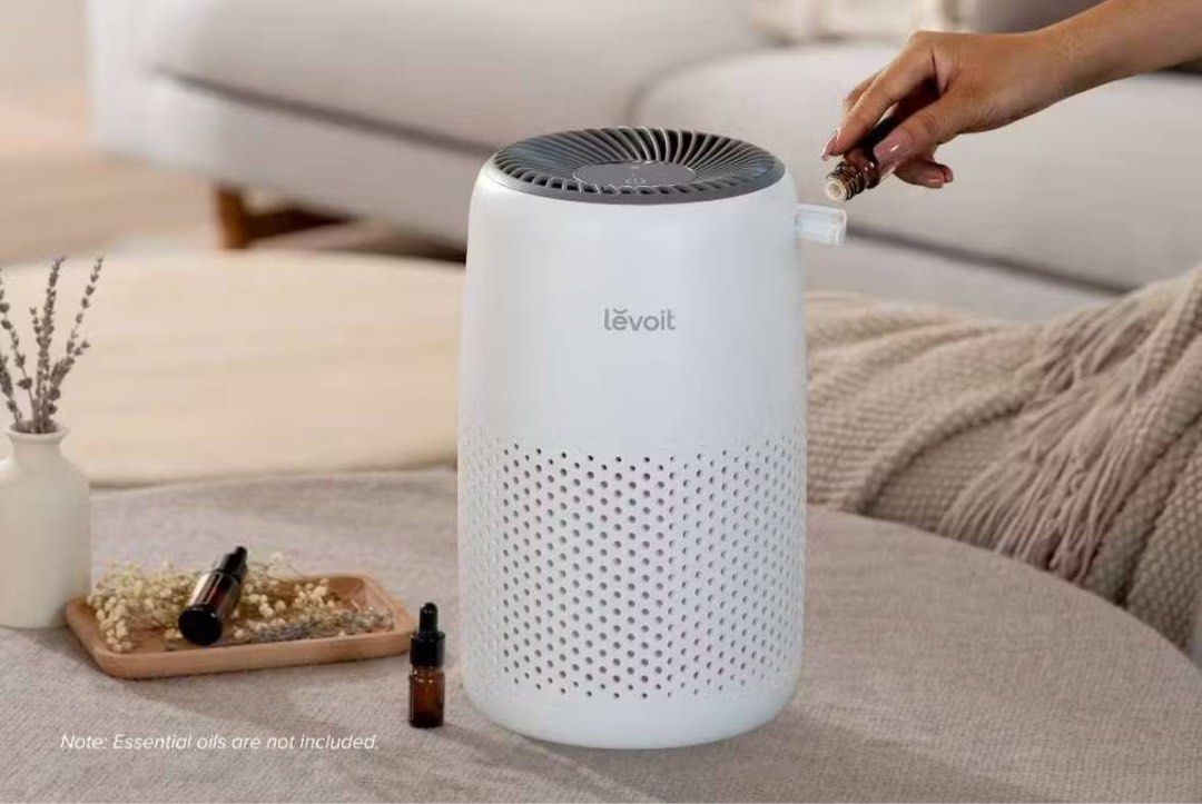 Levoit Air Purifier with Aroma Diffuser Function (Category: Air Purifiers & Dehumidifiers) located in Singapore. Submitted by luckteo (Listing ID 1451969642, Image 1). Description: - White Levoit air purifier - Built-in essential oil slot for added fragrance - Small and compact, ideal for table placement - Keeps your room smelling fresh and clean - Essential oils are not included levoit core mini air purifier rtp $159, used for 3 months + $40 sel