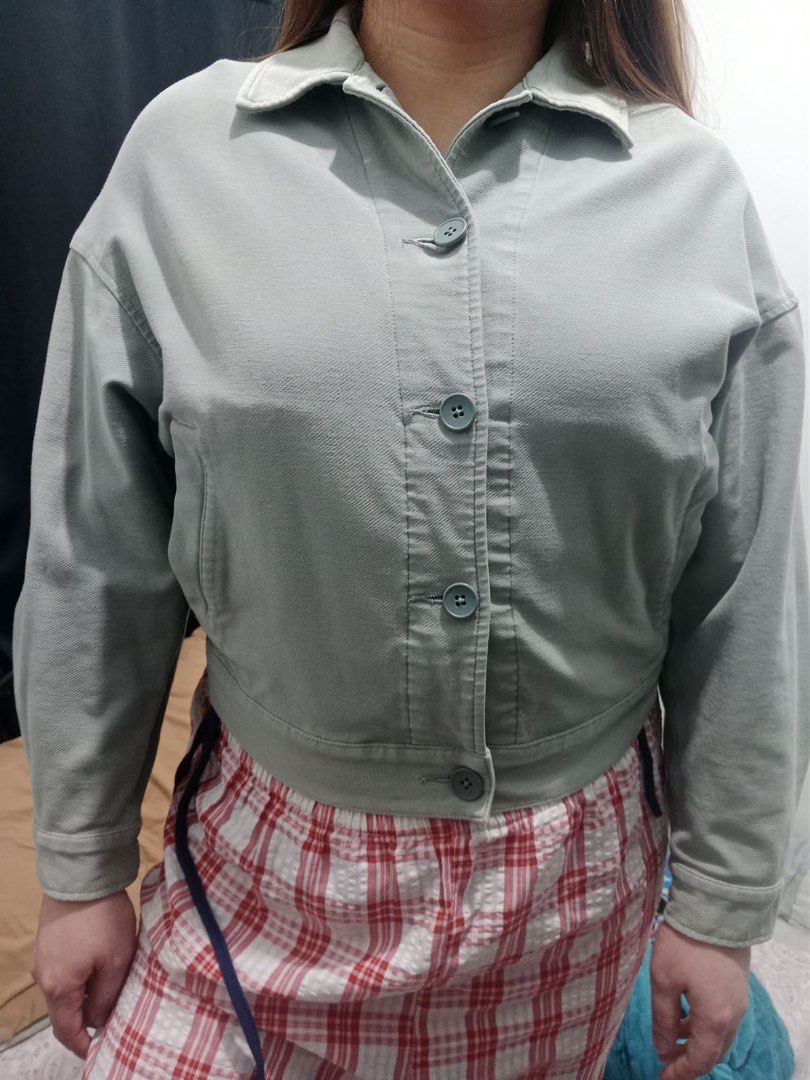Light Green Cropped Blouson Jacket (Category: Coats, Jackets and Outerwear) located in Taguig. Submitted by nazthings (Listing ID 1452047029, Image 1). Description: - Light green cropped jacket - Button-up front - Long sleeves - Casual, everyday style - Ideal for layering - Easy to pair with various outfits - Please check photos for condition details For reference, model is 5’0 in height..