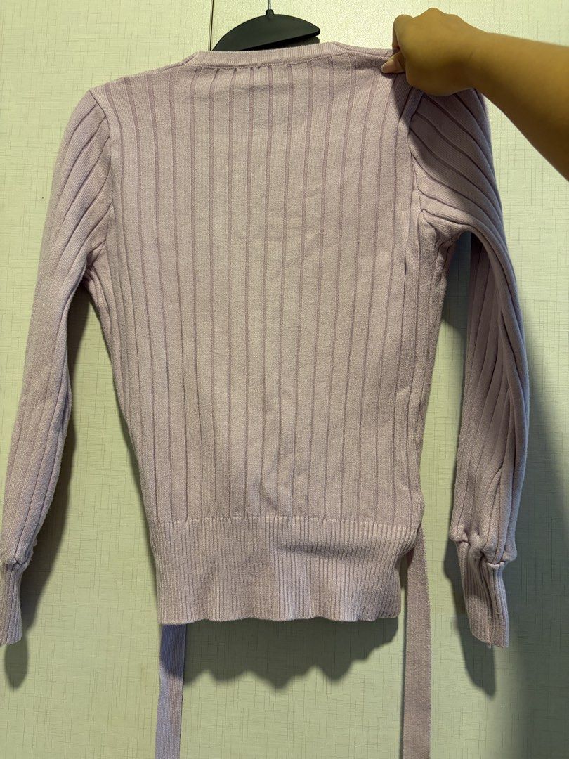 Light Purple Ribbed Wrap Cardigan with Tie (Category: Coats, Jackets and Outerwear) located in Quezon City. Submitted by sparklingberry (Listing ID 1451980444, Image 2). Description: - Light purple ribbed wrap cardigan - Long sleeves with elasticated cuffs - Tie detail to cinch the waist - V-neckline - Soft knit material - Versatile for layering or wearing alone.