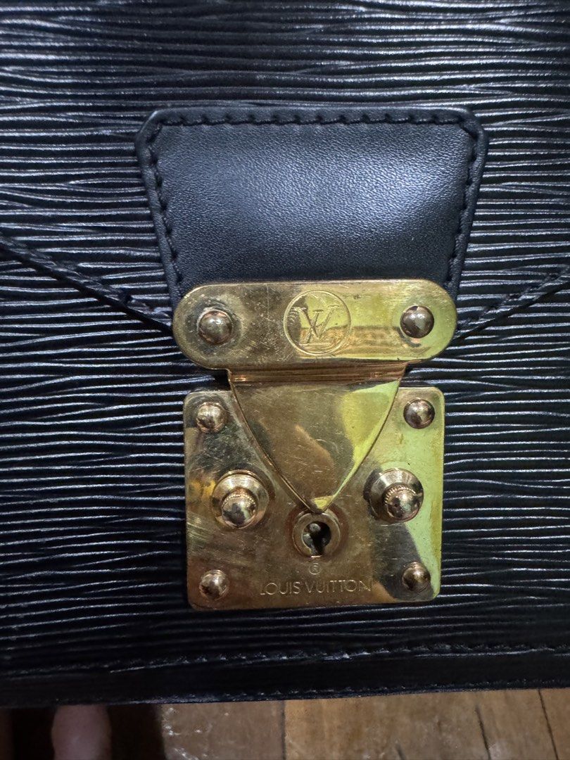 Louis Vuitton Monceau Epi Metis Handbag (Category: Luxury Bags & Wallets) located in Las Pinas. Submitted by katfg (Listing ID 1451942059, Image 2). Description: - Classic black Louis Vuitton handbag - Durable Epi leather texture - Elegant gold hardware with iconic LV logo - Convenient top handle for carrying, comes worh - Interior features a practical small compartment - A timeless and versatile piece for any wardrobe - Suitable for both daily u