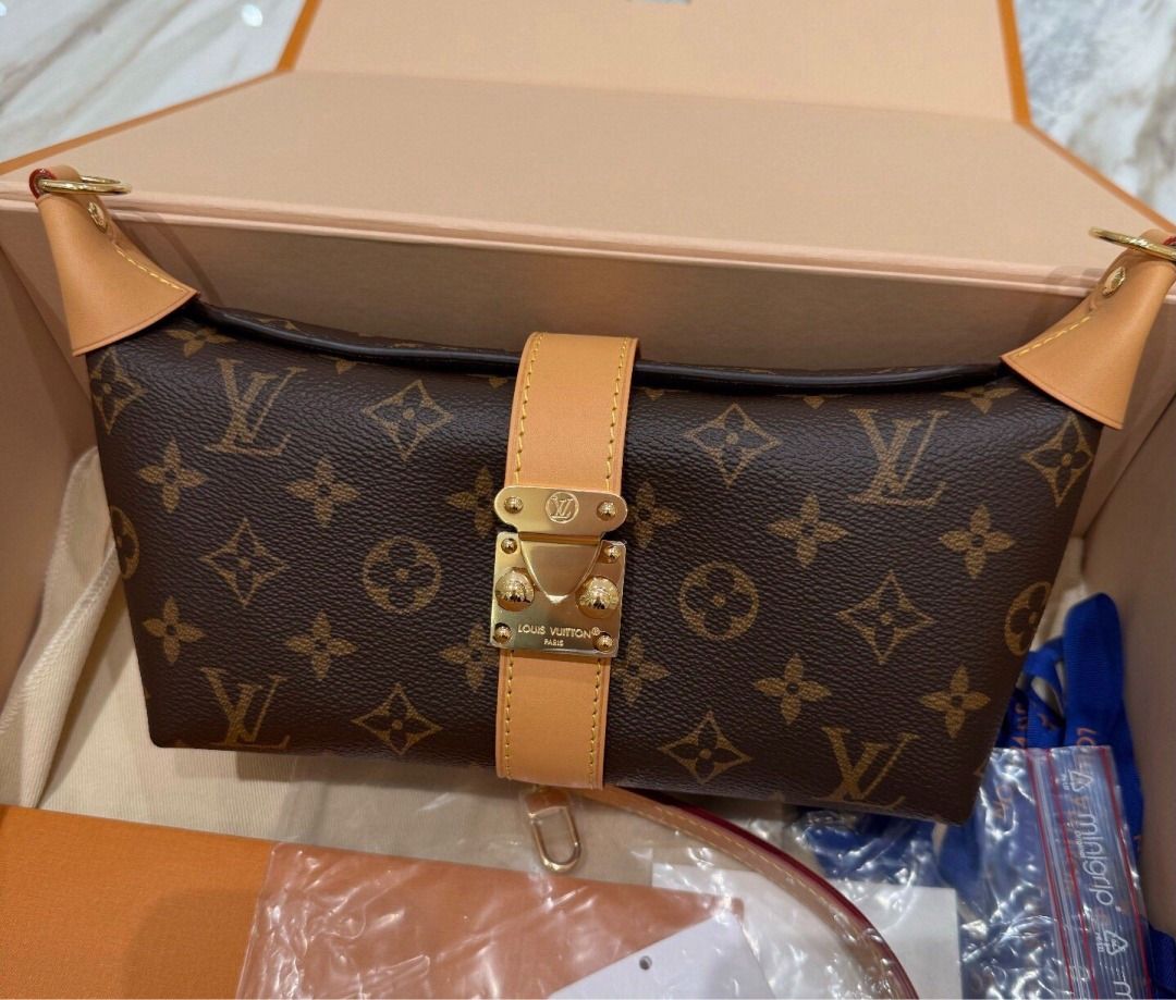 LOUIS VUITTON Nano Side Trunk (Category: Accessories) located in Kuala Lumpur. Submitted by blihiyssin67830 (Listing ID 1451942253, Image 1). Description: Authentic Louis Vuitton Nano Side Trunk Monogram canvas with natural cowhide trim & gold hardware Structured vintage trunk design, equipped with original adjustable crossbody strap Compact size holds daily small essentials, full set original box & dustbag.
