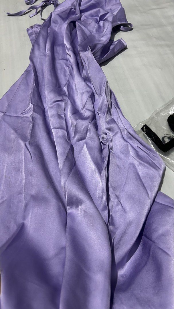 Lovito Lavender Satin Maxi Dress (Category: Dresses) located in Marikina City. Submitted by chartan15 (Listing ID 1452011931, Image 3). Description: - Lovito lavender satin maxi dress - Halter neck with tie-up straps - Flowy skirt for an elegant silhouette - Ideal for special events or a night out - Comes in original packaging.