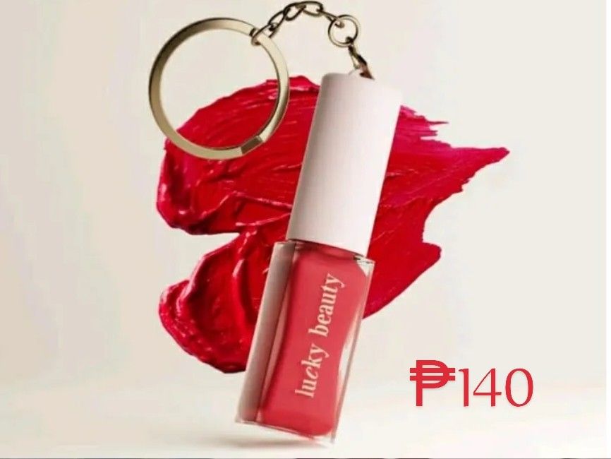 Lucky Beauty Lipstick Keychain (Category: Makeup) located in Manila. Submitted by rlndhenise (Listing ID 1451934454, Image 1). Description: - Cute lipstick keychain from Lucky Beauty - Lovely red shade - Great as a bag charm or accessory - Perfect for makeup lovers.