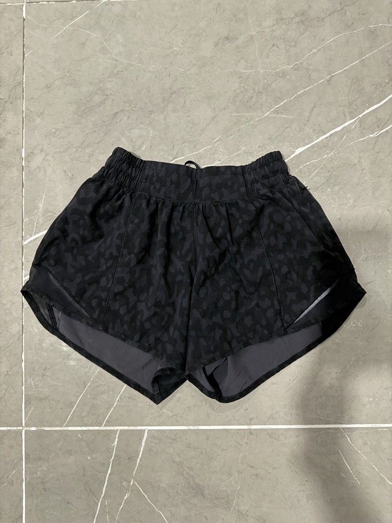 Lululemon Black Leopard Print Running Shorts Size 2 Tall (Category: Activewear) located in Valenzuela. Submitted by i_flauntph (Listing ID 1452053155, Image 2). Description: - Lululemon running shorts - Color: Black with subtle leopard print - Size: 2 Tall - Fits XS-S - Features: Comfortable elastic waistband, built-in liner - Material: Lightweight and breathable - Versatile: Great for workouts or casual wear - with 1 zipper side pocket - RFS: wr