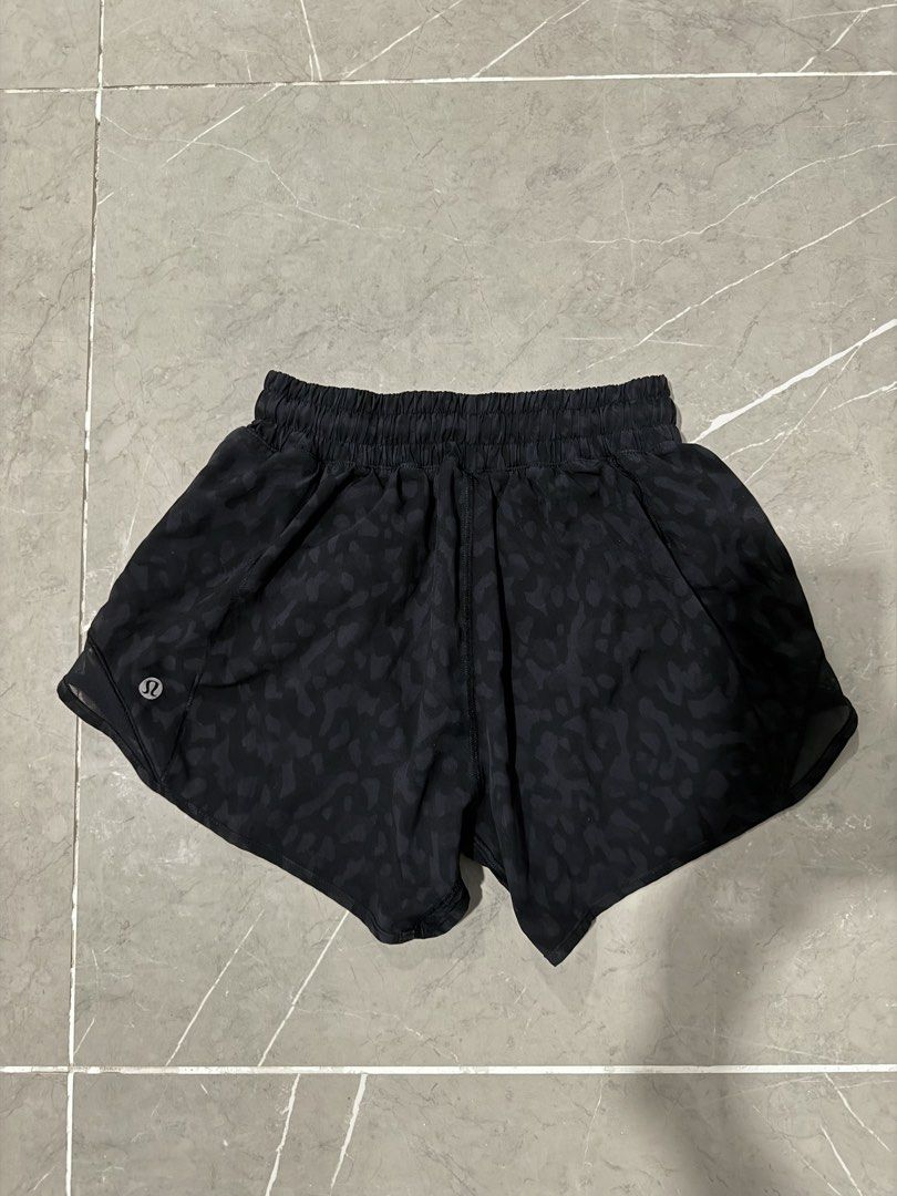 Lululemon Black Leopard Print Running Shorts Size 2 Tall (Category: Activewear) located in Valenzuela. Submitted by i_flauntph (Listing ID 1452053155, Image 1). Description: - Lululemon running shorts - Color: Black with subtle leopard print - Size: 2 Tall - Fits XS-S - Features: Comfortable elastic waistband, built-in liner - Material: Lightweight and breathable - Versatile: Great for workouts or casual wear - with 1 zipper side pocket - RFS: wr