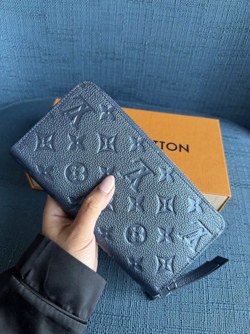 LV empreinte zippy in navy (Category: Luxury Bags & Wallets) located in Subic. Submitted by grabmywardrobe (Listing ID 1451932998, Image 1). Description: NEVER USED / LIKE NEW complete with box dust bag slight negotiable .