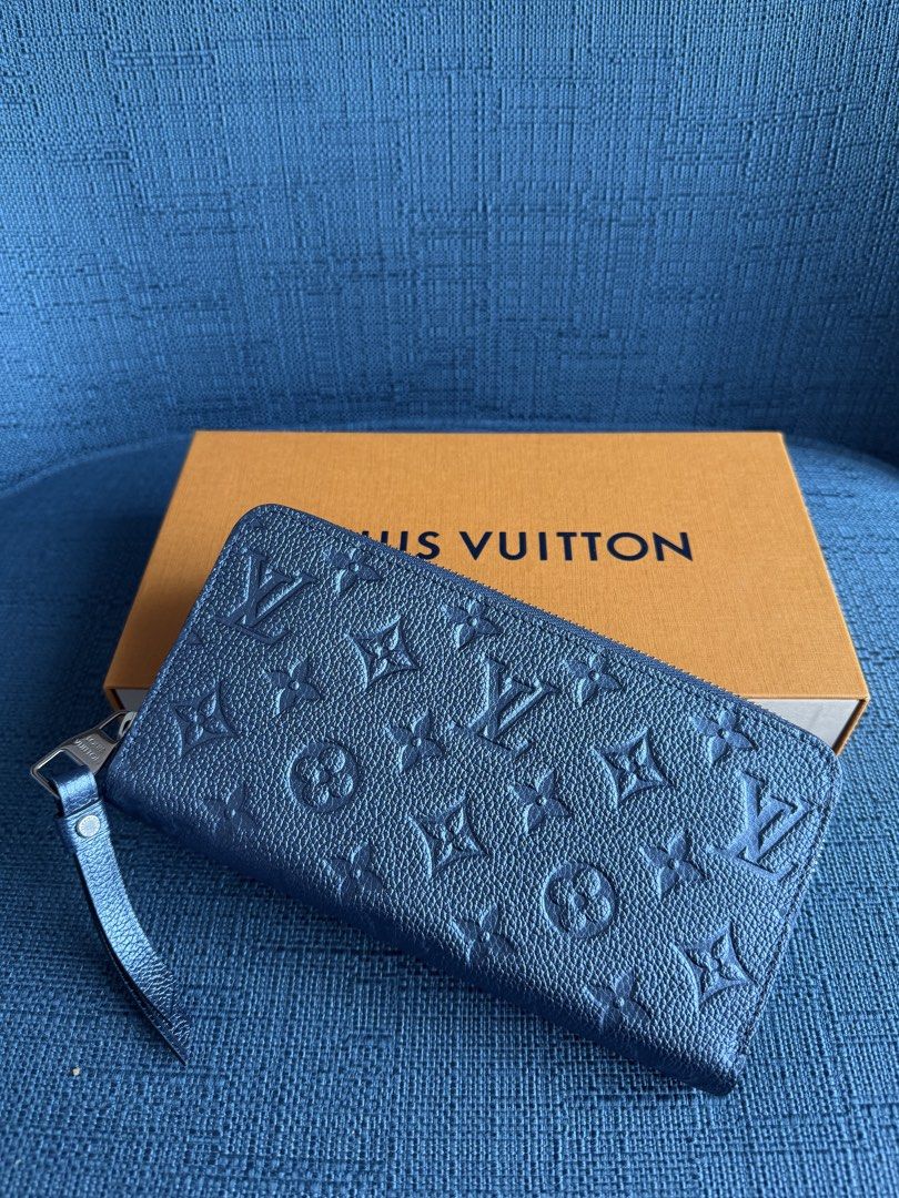 LV empreinte zippy in navy (Category: Luxury Bags & Wallets) located in Subic. Submitted by grabmywardrobe (Listing ID 1451932998, Image 3). Description: NEVER USED / LIKE NEW complete with box dust bag slight negotiable .